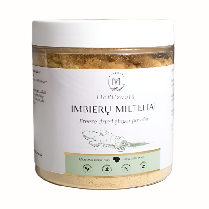 A glass jar containing freeze-dried ginger powder with a white lid and a label that reads "Freeze dried ginger powder" along with an illustration of ginger root. The label includes the Lithuanian product name "Imbierų milteliai," and a net weight of 55g.