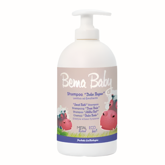 A large bottle of Bema Baby Sweet Bath Shampoo, featuring a playful hippopotamus on the label. The shampoo is described as a gentle and emollient formula for babies, with the text "Shampoo Dolce Bagno" prominently displayed. The product is labeled "Metal Tested" and "Eco Bio." The pump dispenser allows for easy use, and the packaging includes multilingual product information.