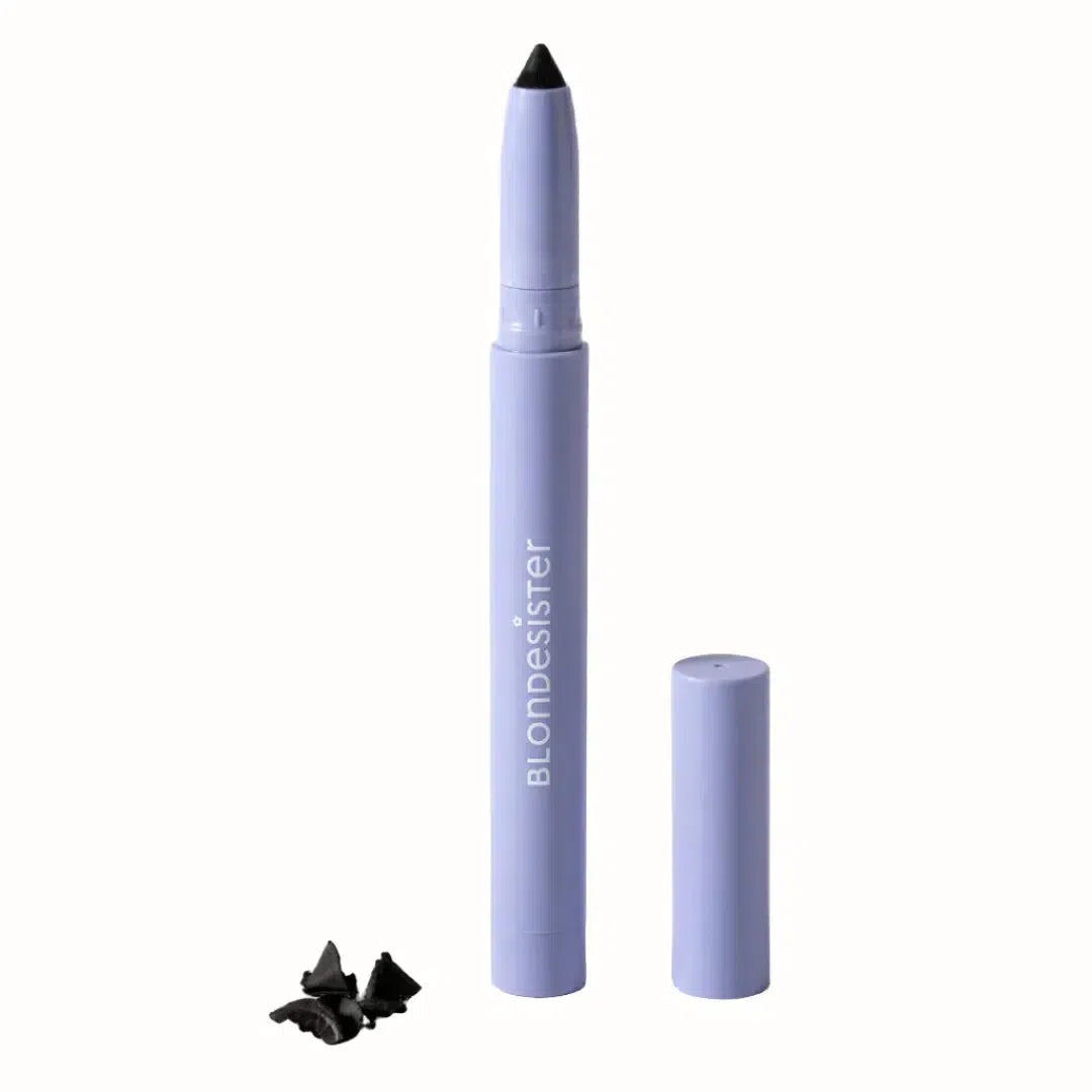 A black eyeliner pencil from the brand Blondesister. The pencil has a sleek, lavender-colored casing, with the brand name "Blondesister" written in white lettering on the side. The cap is removed, revealing the black tip of the pencil.