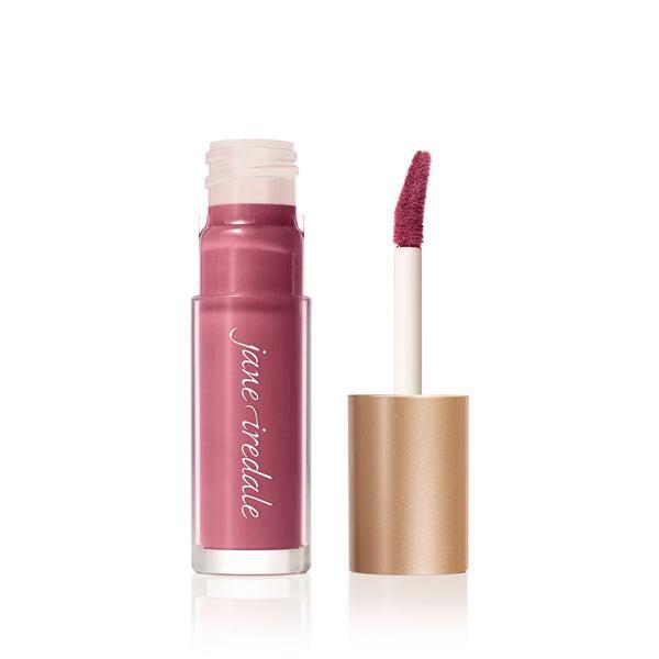 Jane Iredale Lip Gloss
A tube of Jane Iredale Lip Gloss in a soft pink shade with a glossy finish, accompanied by a precise, doe-foot applicator for easy application. This lip gloss provides a smooth texture and a natural, hydrated look, perfect for everyday wear. The sleek, gold-colored packaging adds a touch of elegance to your beauty routine.