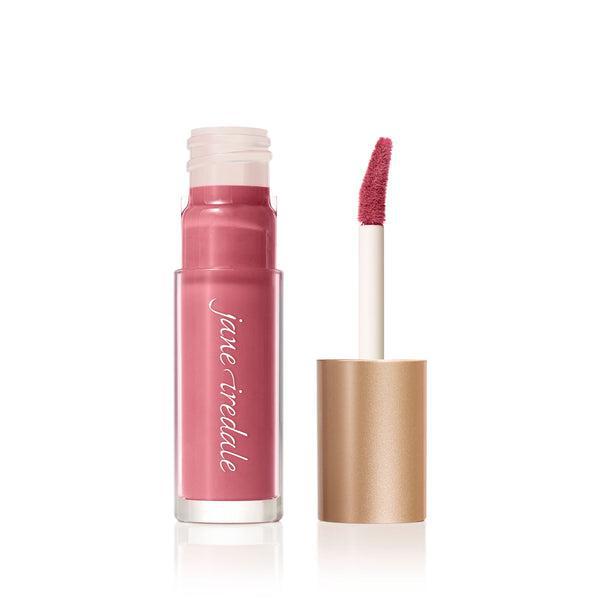 Jane Iredale Lip Gloss
A tube of Jane Iredale Lip Gloss in a soft pink shade with a glossy finish, accompanied by a precise, doe-foot applicator for easy application. This lip gloss provides a smooth texture and a natural, hydrated look, perfect for everyday wear. The sleek, gold-colored packaging adds a touch of elegance to your beauty routine.