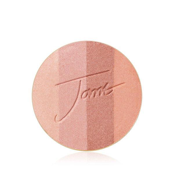 PureBronze Matinio Bronzanto Papildymas Medium
A compact of PureBronze Matinio Bronzanto Papildymas in the medium shade, featuring a sunburst design embossed into the product. The bronzer is housed in a round, open compact and the label reads "Bronzer" beneath the sunburst pattern, providing a matte finish. The product offers a natural, bronzed look for medium skin tones.