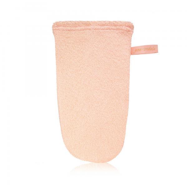 A soft, plush tanning mitt designed for easy and streak-free application of self-tanner. Its velvety texture ensures smooth, even coverage while protecting hands from staining.