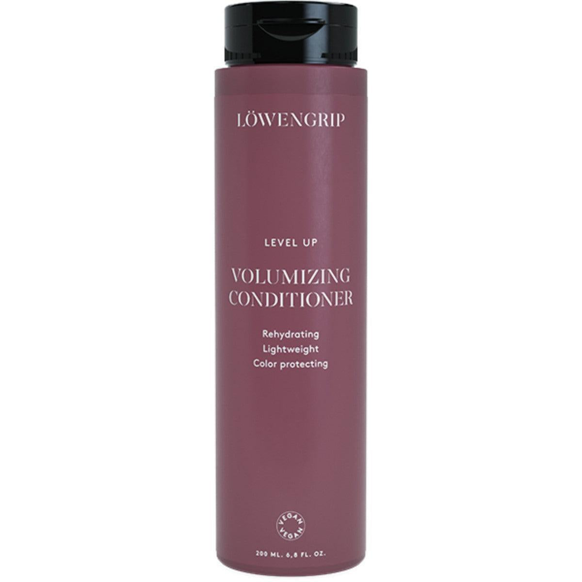 Volumizing Conditioner
A bottle of volumizing conditioner with a burgundy label, featuring the product's key benefits: rehydrating, lightweight, and color protecting. The product is designed to give hair more volume while maintaining color vibrancy and softness.