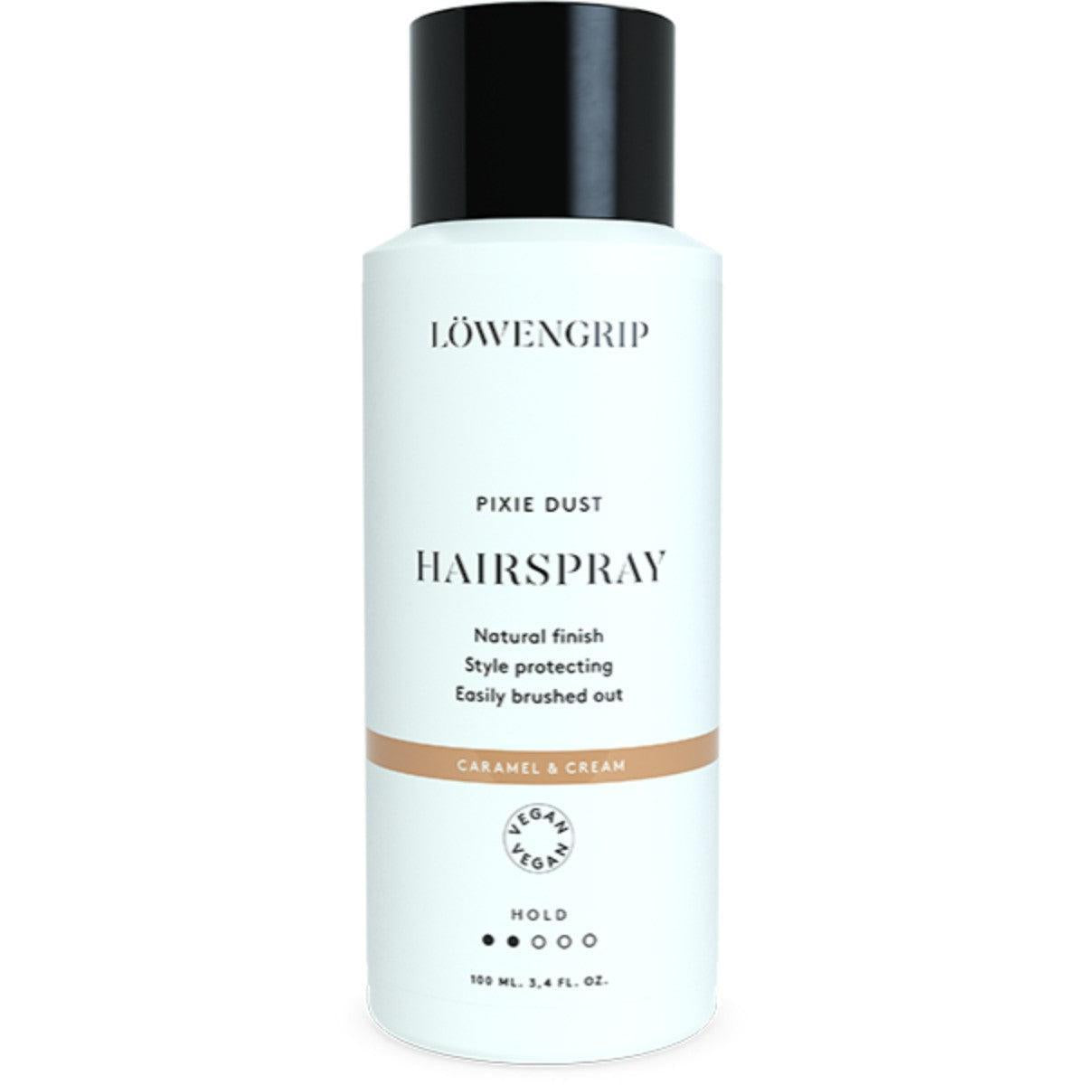 Löwengrip Pixie Dust Hairspray
This hairspray provides a natural finish with style protection. It helps maintain volume while giving your hair a smooth, shiny look without the stiff, crunchy feel. The formula is designed to keep your hairstyle intact while still being easy to brush out. Available in a 100 ml size with a soothing caramel and cream scent, this vegan hairspray is perfect for everyday use. It offers a light hold that ensures your hair stays flexible and natural all day long.