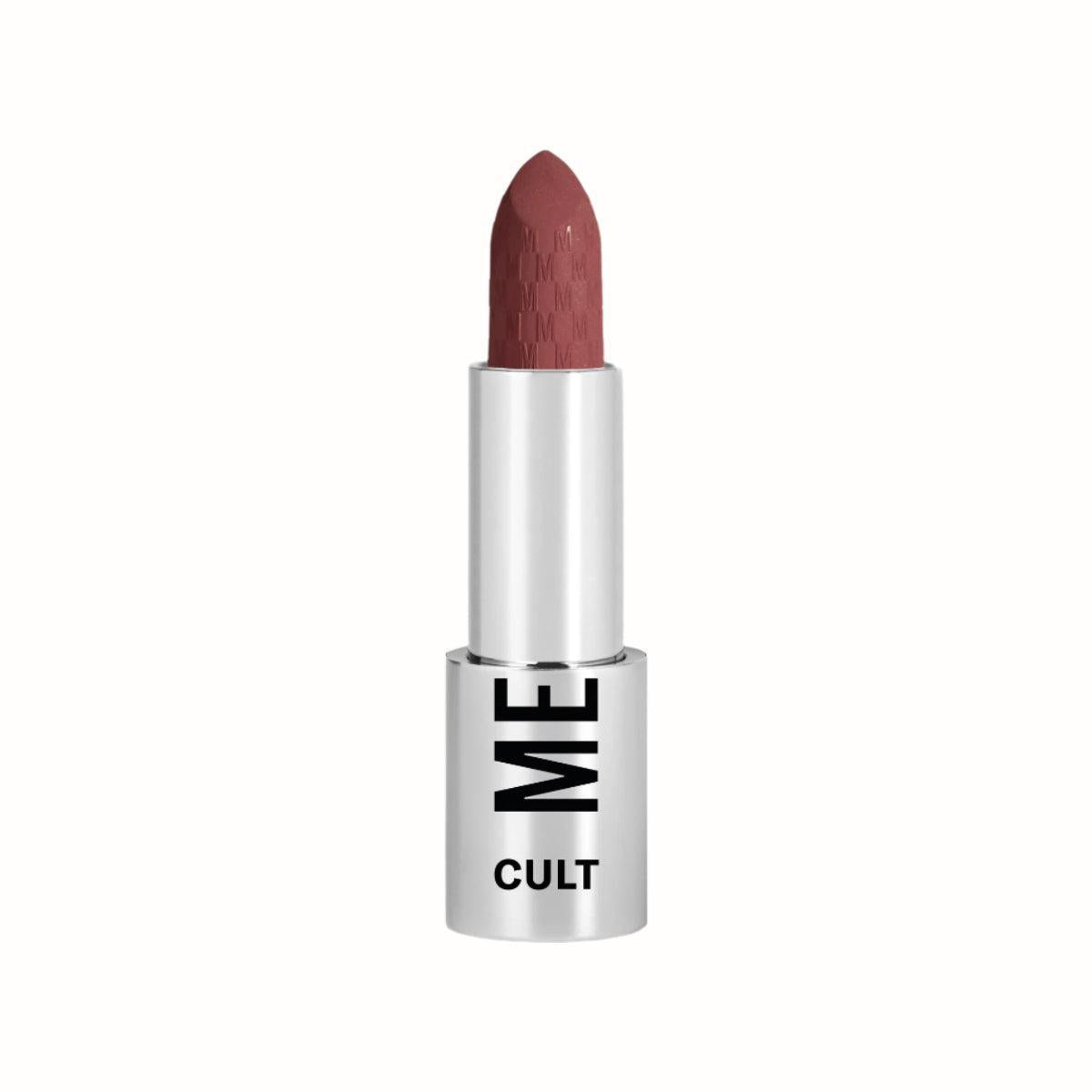 A bullet of matte red lipstick from the Cult collection by Mesauda, featuring a sleek silver casing with the "ME" and "CULT" branding. The lipstick has a smooth, creamy texture with a long-lasting finish, perfect for adding a bold, sophisticated touch to any look.