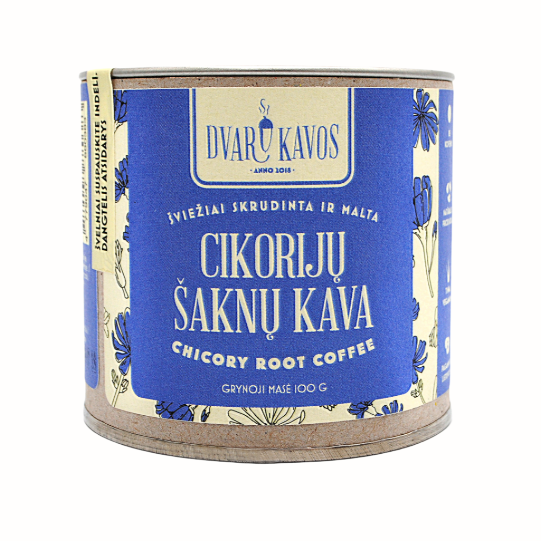 A can of Dvaru Kavos chicory root coffee with the label in blue and yellow, featuring the Lithuanian text "Cikorijų Šaknų Kava" and "Chicory Root Coffee." The product is labeled as freshly roasted and ground, with a net weight of 100g, and includes illustrations of chicory flowers.