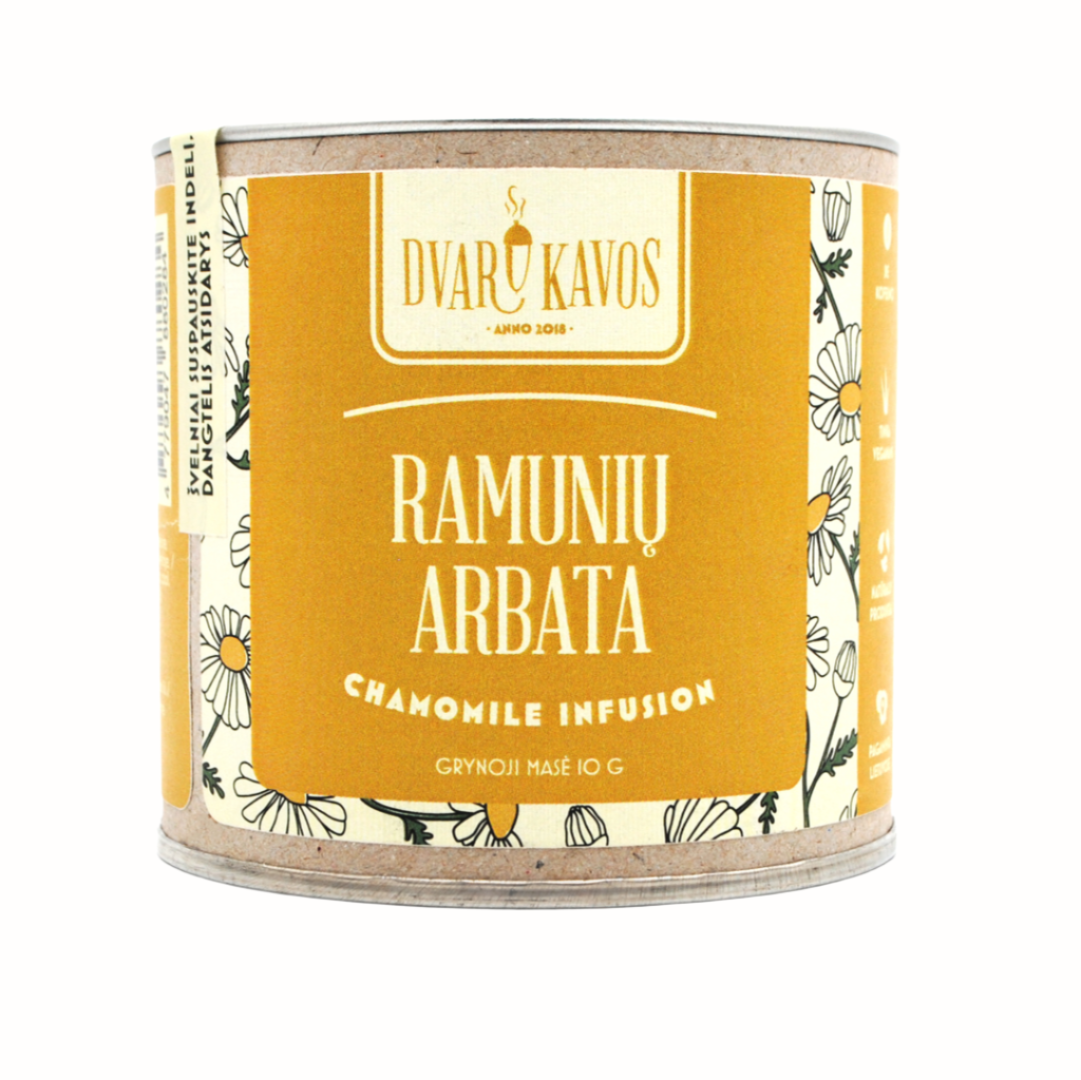 
A can of Dvaru Kavos chamomile infusion with a yellow label featuring the Lithuanian text "Ramunijų Arbata" and "Chamomile Infusion" in English. The design includes illustrations of chamomile flowers. The product is labeled with a net weight of 10g.