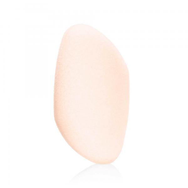 A close-up of a soft, light pink Flocked Sponge designed for applying loose and pressed powders. The sponge has a smooth surface ideal for blending makeup evenly and achieving a flawless finish.