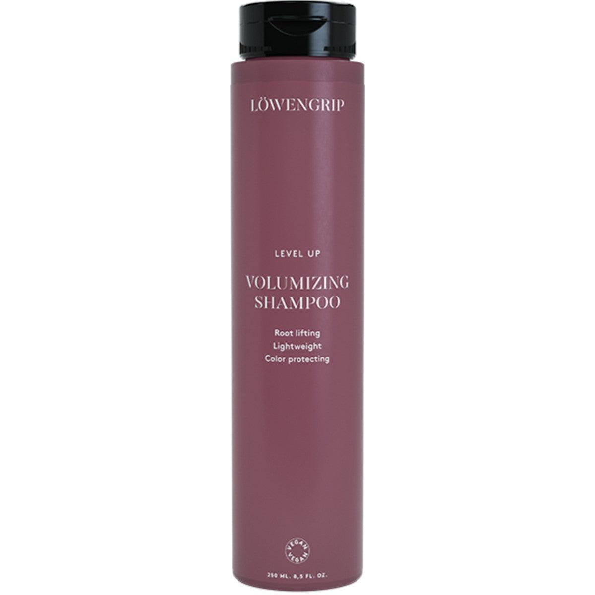 
A bottle of Löwengrip Volumizing Shampoo with a sleek design and black cap. The product is formulated for root lifting and lightweight volume, while also protecting hair color. It’s ideal for those seeking enhanced volume and nourishment.
