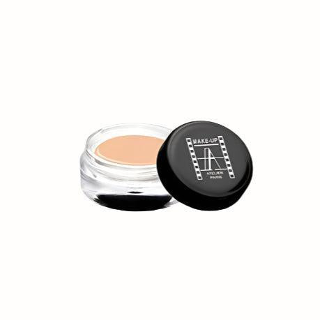 
A small clear jar with a black lid containing a creamy concealer. The formula is designed to cover blemishes and dark circles, providing full coverage with a smooth, blendable texture.