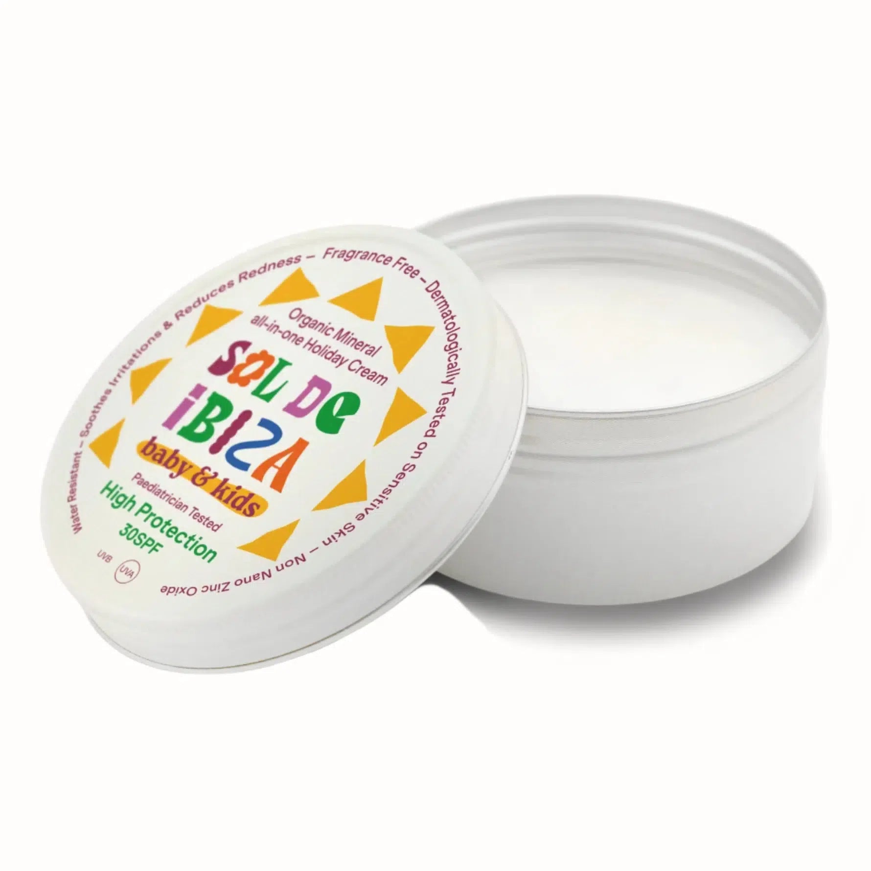 
A tin of Sol de Ibiza baby & kids organic mineral sunscreen with SPF 50, featuring a colorful label with geometric shapes in orange, green, and red. The product is marketed as a high-protection sunscreen, dermatologically tested, and designed specifically for babies and kids. It is noted for its water resistance, ability to soothe skin, reduce redness, and its fragrance-free formula. The cream is also peadriatrician-tested, non-nano, and free from synthetic ingredients. T